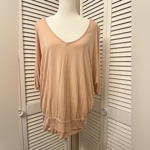 Billowing blouse fitted waist open back